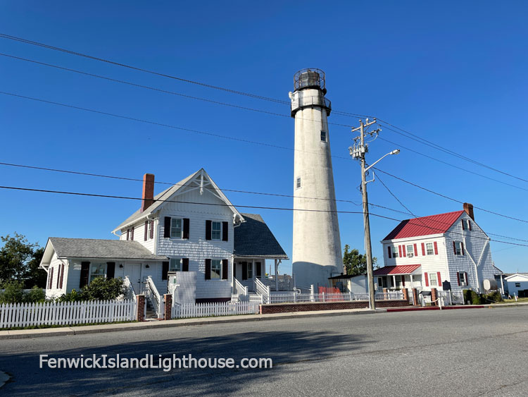 image of the fenwick island lighthouse with wires and pole